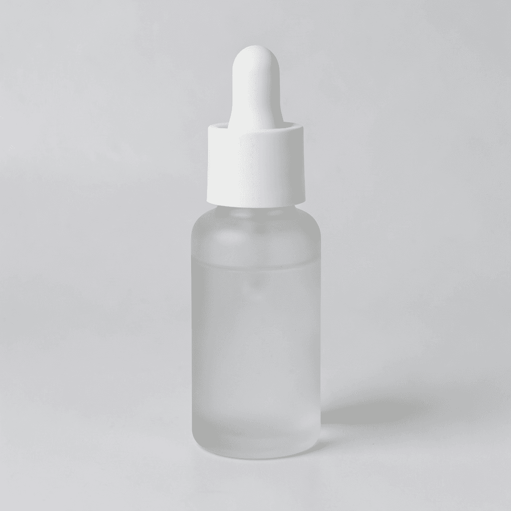 Serum bottle on a marble countertop by a window · Before