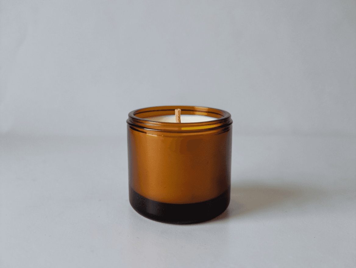 Candle kept in place on a bedside table · Before